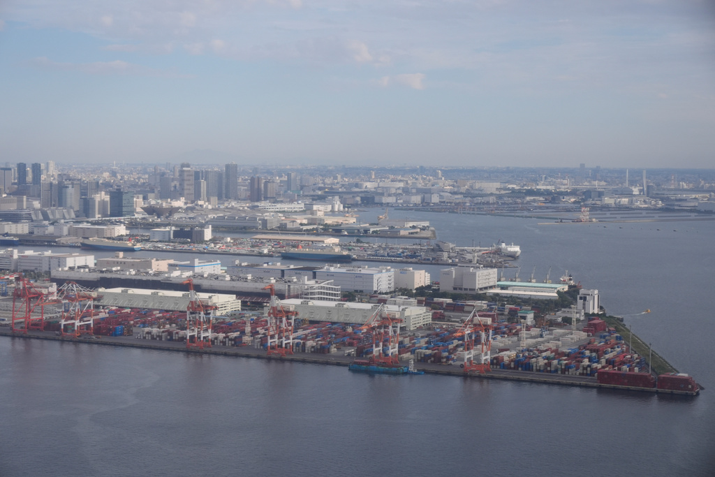 FILE - A container port is seen from a helicopter in Tokyo, Oct. 29, 2025. (AP Photo/Mark Schiefelbein, File)