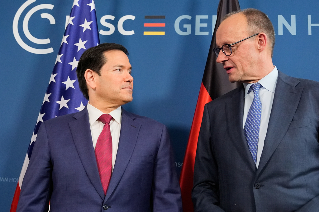 U.S. Secretary of State Marco Rubio, left, and Germany's Chancellor Friedrich Merz meet in Munich, Germany, Friday, Feb. 13, 2026, at the Munich Security Conference. (AP Photo/Alex Brandon, Pool)