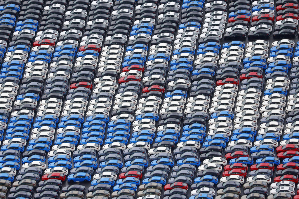 FILE - Vehicles are parked for export at a Yokohama port, near Tokyo on Aug. 1, 2025. (Takuto Kaneko/Kyodo News via AP, File)