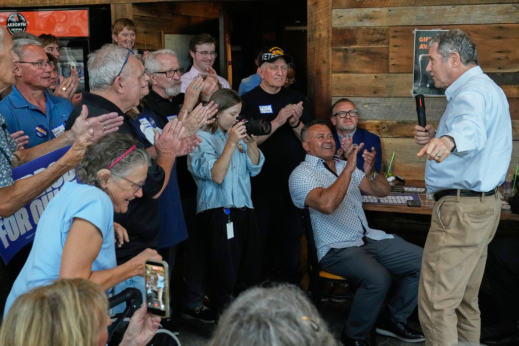 FILE - Supporters applaud as Democratic Ohio Senate candidate Sherrod Brown, a former three-term U.S. senator, speaks at a campaign event in Akron, Ohio, on July 16, 2026. (AP Photo/Sue Ogrocki, File)