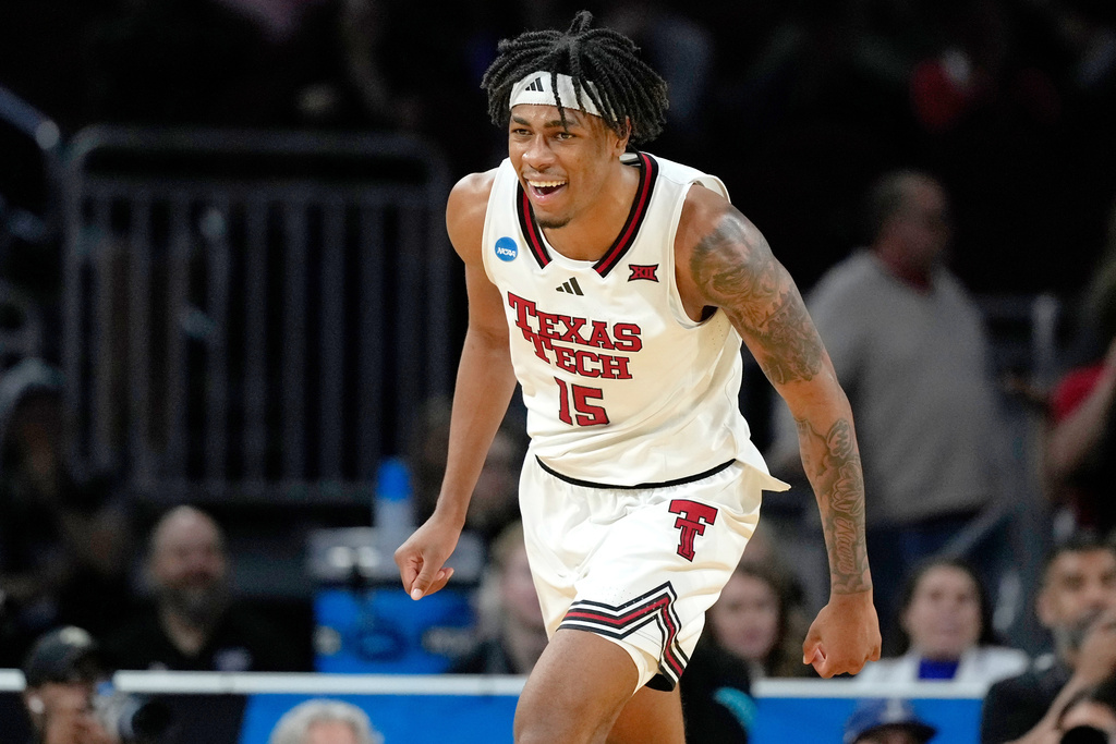 FILE - Texas Tech forward JT Toppin celebrates after scoring a basket during the second half against UNC Wilmington in the first round of the NCAA college basketball tournament, Friday, March 21, 2025, in Wichita, Kan. (AP Photo/Charlie Riedel)