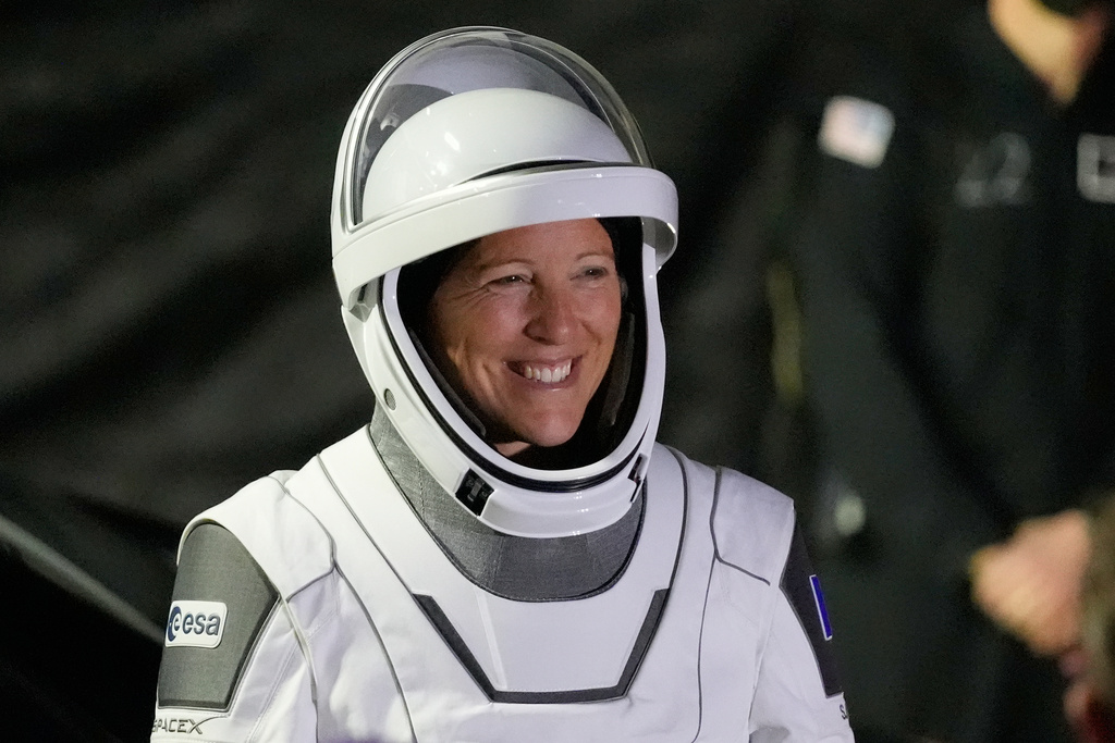 Crew 12 ESA astronaut Sophia Adenot, of France, leaves the Operations and Checkout building before heading to pad 40 at the Cape Canaveral Space Force Station in Cape Canaveral, Fla., Friday, Feb. 13, 2026, on a mission to the International Space Station. (AP Photo/John Raoux)