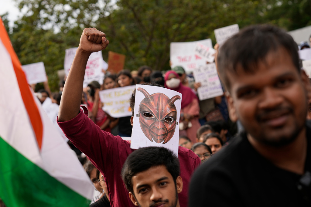 FILE- A participant wearing a cockroach mask attends a protest as part of a youth-led campaign demanding educational reforms in Bengaluru, India, Monday, July 20, 2026. (AP Photo/Aijaz Rahi, File)