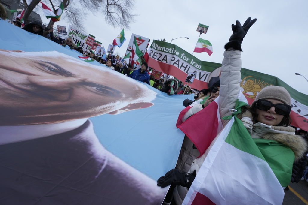 Supporters of Iran's exiled Crown Prince Reza Pahlavi attend a demonstration in Toronto, Saturday, Feb. 14, 2026. (AP Photo/Kamran Jebreili)