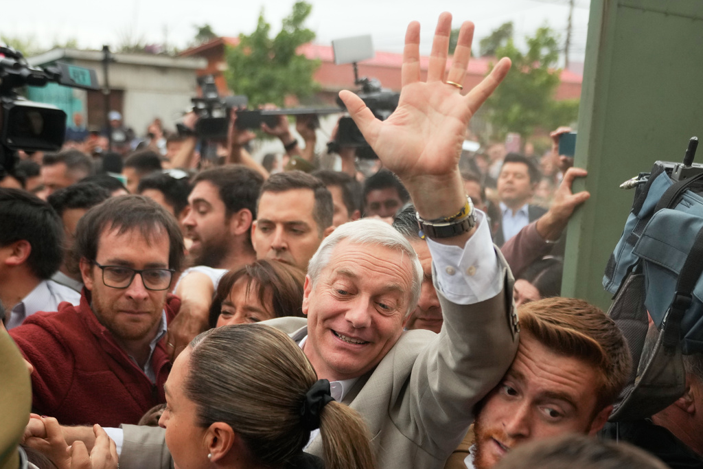 Jose Antonio Kast, presidential candidate for the Republican Party, arrives to vote during the presidential runoff election in Santiago, Chile, Sunday, Dec. 14, 2025. (AP Photo/Matias Delacroix)
