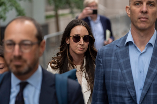 Charlie Javice, center, exits Manhattan federal court, Monday, Sept. 29, 2025, in New York. (AP Photo/Yuki Iwamura) Charlie Javice, center, exits Manhattan federal court, Monday, Sept. 29, 2025, in New York. (AP Photo/Yuki Iwamura)