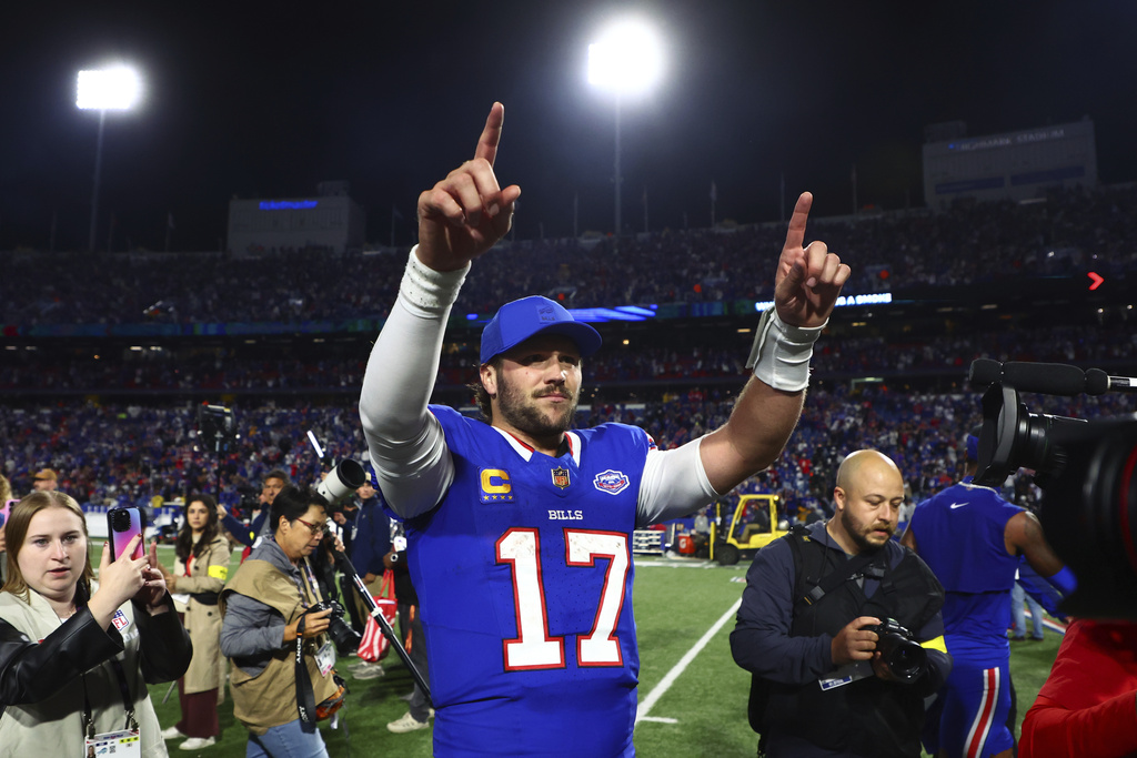 Buffalo Bills quarterback Josh Allen (17) celebrates the team's win over Baltimore Ravens in an NFL football game in Orchard Park, N.Y., Sunday, Sept. 7, 2025. (AP Photo/Jeffrey T. Barnes)