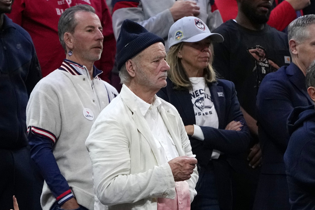 Bill Murray watches during the first half between UConn and Furman in the first round of the NCAA college basketball tournament, Friday, March 20, 2026, in Philadelphia. (AP Photo/Matt Slocum)