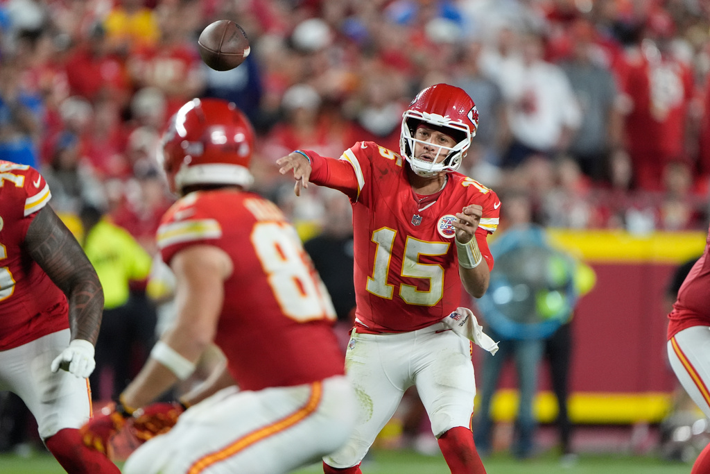 Kansas City Chiefs quarterback Patrick Mahomes throws during the second half of an NFL football game against the Detroit Lions Sunday, Oct. 12, 2025, in Kansas City, Mo. (AP Photo/Charlie Riedel)