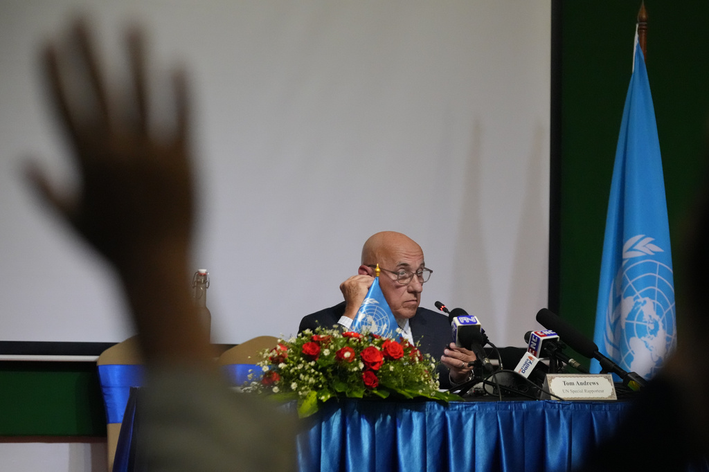 U.N. Special Rapporteur on the situation of human rights Tom Andrews, right, listens to a question during a press conference in Phnom Penh Cambodia, Friday, July 31, 2026. (AP Photo/Heng Sinith)