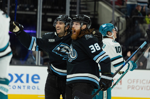 Utah Mammoth center Liam O'Brien (38) celebrates the goal with left wing Brandon Tanev (13) against San Jose Sharks during the second period of an NHL hockey game Friday, Oct. 17, 2025, in Salt Lake City. (AP Photo/Melissa Majchrzak) Utah Mammoth center Liam O'Brien (38) celebrates the goal with left wing Brandon Tanev (13) against San Jose Sharks during the second period of an NHL hockey game Friday, Oct. 17, 2025, in Salt Lake City. (AP Photo/Melissa Majchrzak)