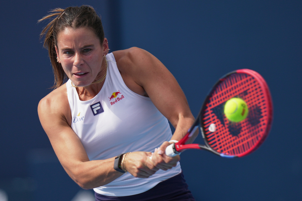 Emma Navarro, of the United States plays a backhand return to Lois Boisson, of France during the women's singles match for the China Open tennis tournament, at the National Tennis Center, in Beijing, Monday, Sept. 29, 2025. (AP Photo/Andy Wong)