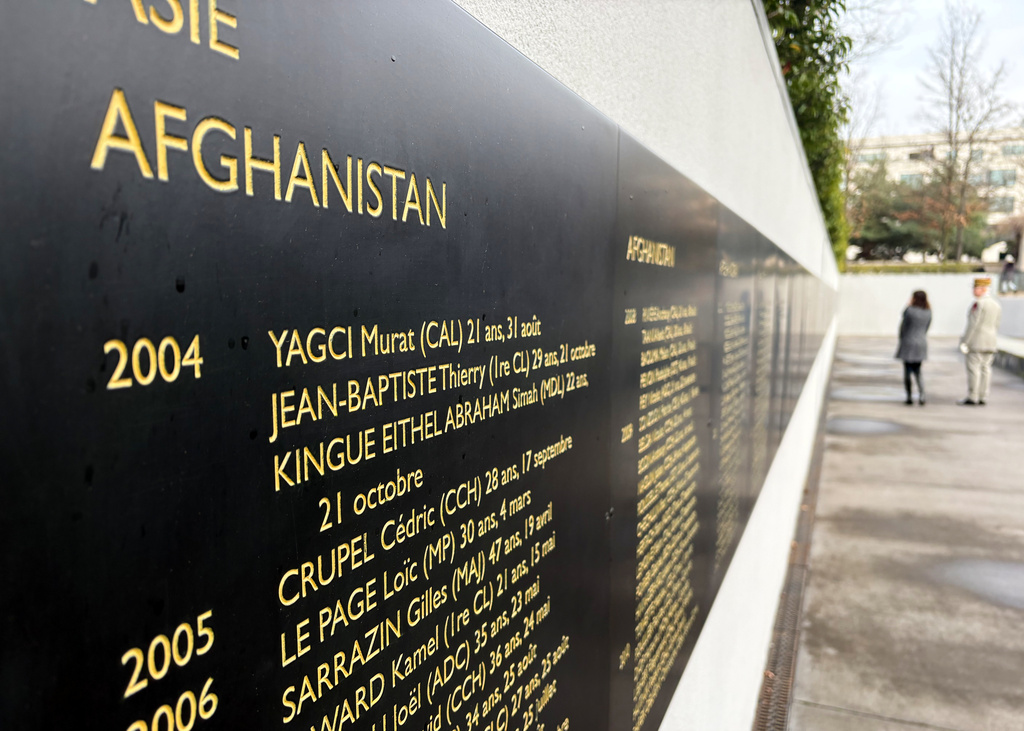 The names of French troops killed in NATO operations in Afghanistan, where they fought with U.S. and other allied forces, are displayed Monday, Jan. 26, 2026, at a memorial in Paris to French troops killed in operations overseas (AP Photo/John Leicester)