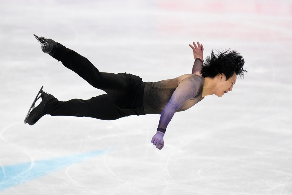 Adam Siao Him Fa from France competes during the men's short program at the Figure Skating World Championships in Prague, Czech Republic, Thursday, March 26, 2026. (AP Photo/Petr David Josek)