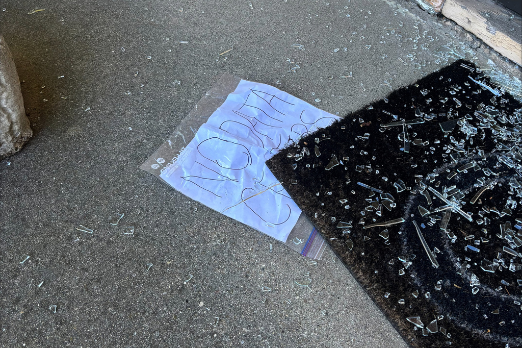 This photo provided by Sara Hindi, chief communications officer for the Indianapolis City-County Council shows damage at the front door of Councilman Ron Gibson's Indianapolis home on Monday, April 6, 2026. (Communications office for the Indianapolis City-County Council via AP)