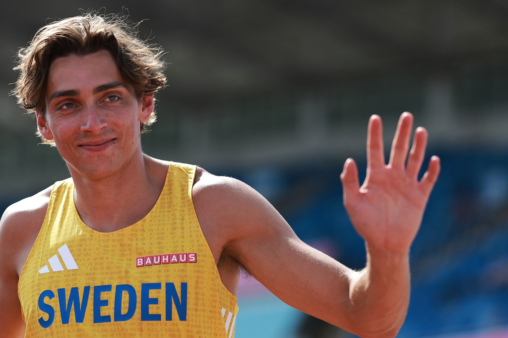 Armand Duplantis of Sweden waves to the public after competing in the men's pole vault qualifying at the European Athletics Championships in Birmingham, England, Friday, Aug. 14, 2026. (AP Photo/Morgan Harlow)